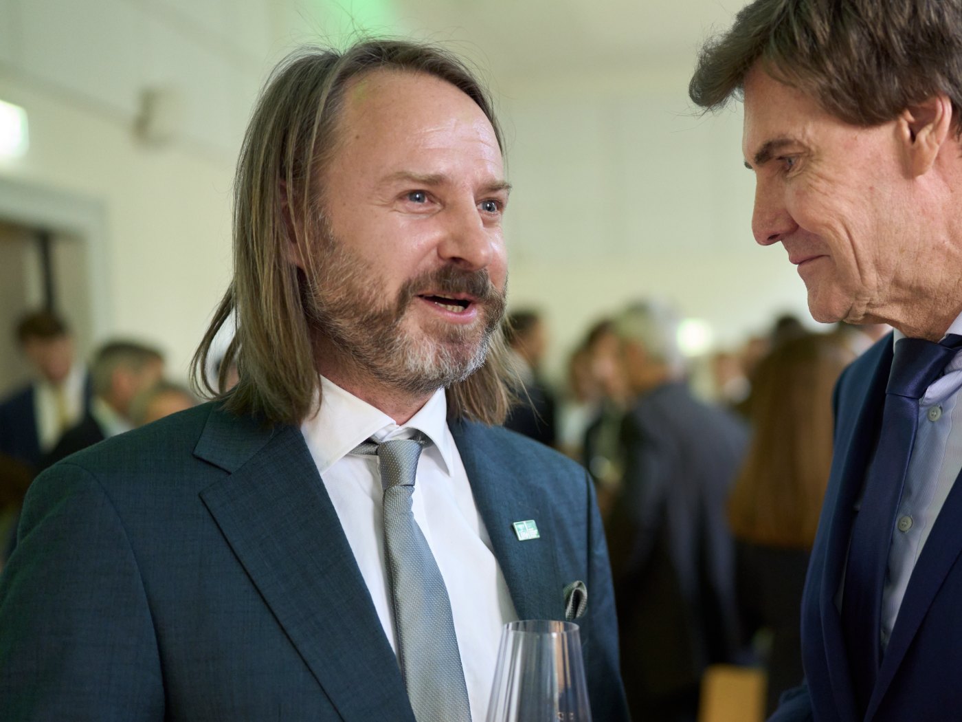 Philipp Baaske in conversation at an LMU event